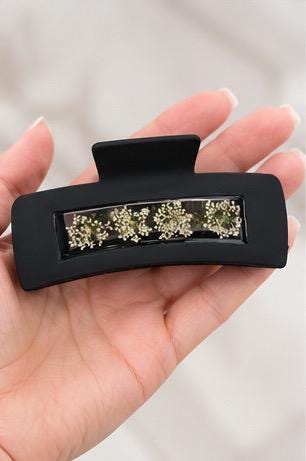 Handmade black and white real pressed flower claw clips.