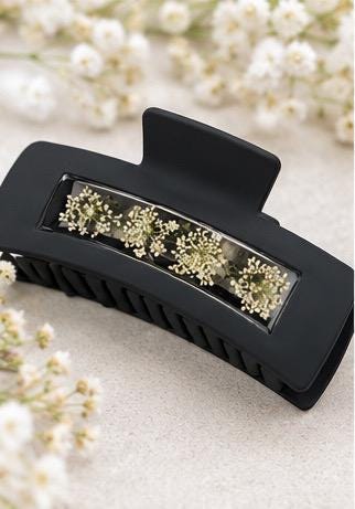 Handmade black and white real pressed flower claw clips.