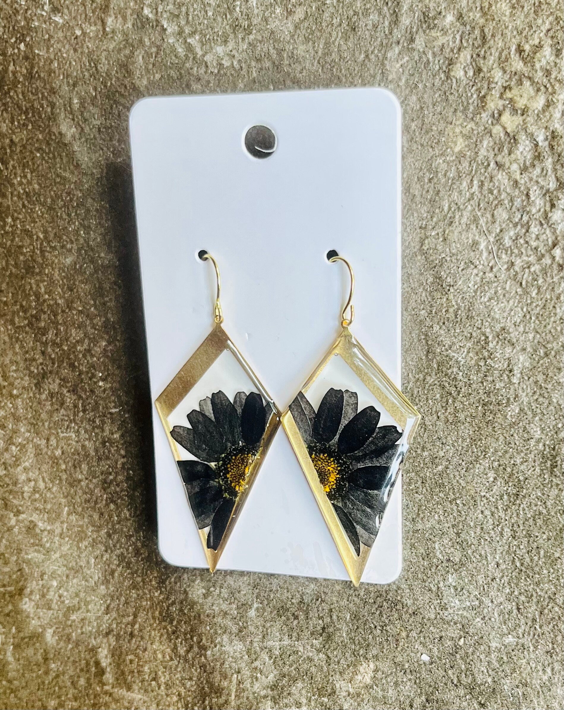 Spooky black daisies earrings. 14 K Gold plated earring hooks.